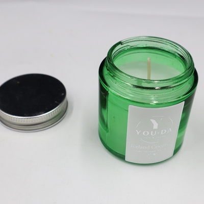 A cera da soja Scented Mason Jar Candles Coconut Oil caseiro no vidro verde