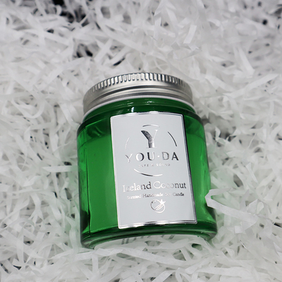A cera da soja Scented Mason Jar Candles Coconut Oil caseiro no vidro verde