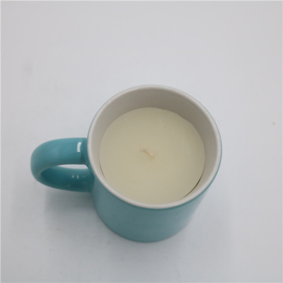 O copo de chá redondo azul brilhante da casa do aroma Scented a vela cerâmica 5.5oz da soja
